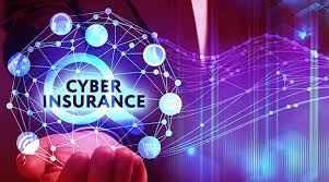 A business owner reviewing cyber insurance policy documents on a laptop, emphasizing online protection in 2025.